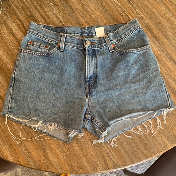 Light wash Distressed Levi’s - Picture 1 of 3